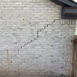 Cracked Brick Wall Exterior