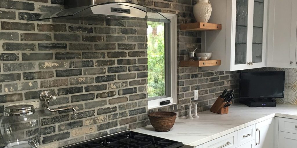 Kitchen With Brick Veneer Backsplash
