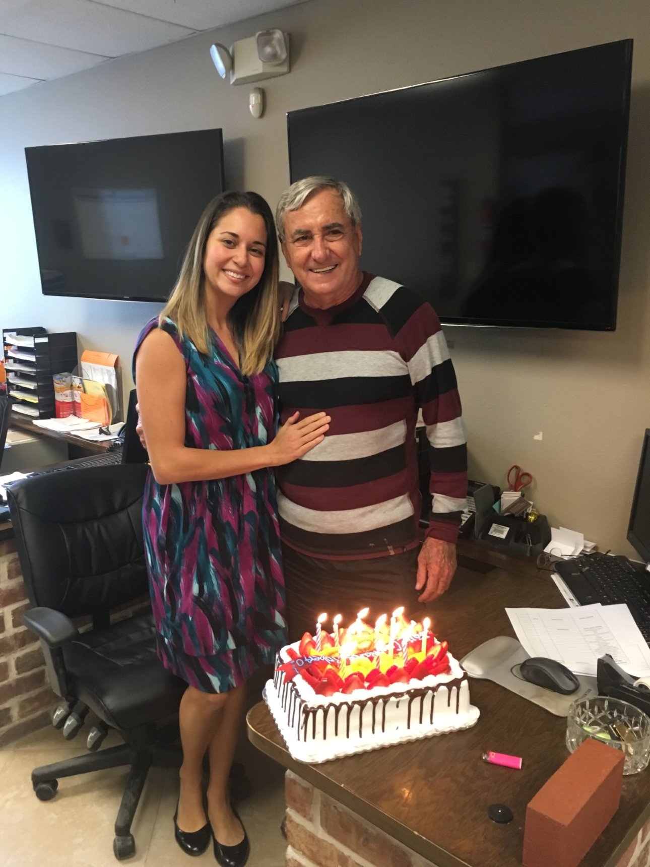 Roberto and Diana at Office Celebration