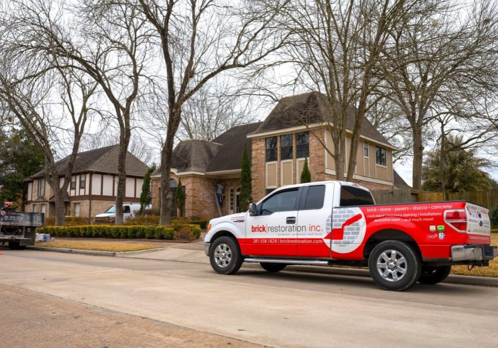 Brick Restoration Truck Outside Home For Consultation