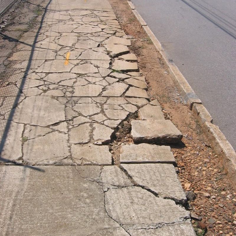 Broken and Cracked Sidewalk