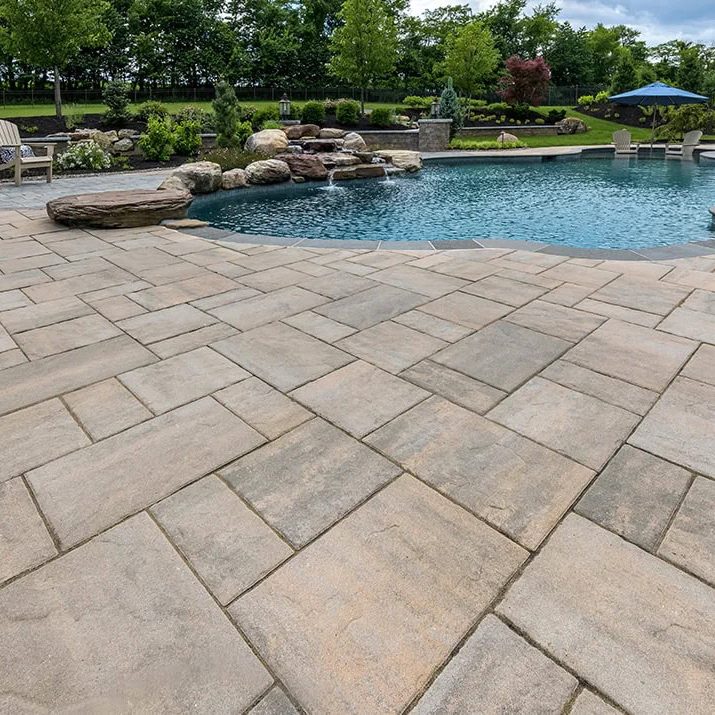 Pavers Around Pool in Backyard